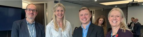 Photo of Johanna Beresford among other senior leaders